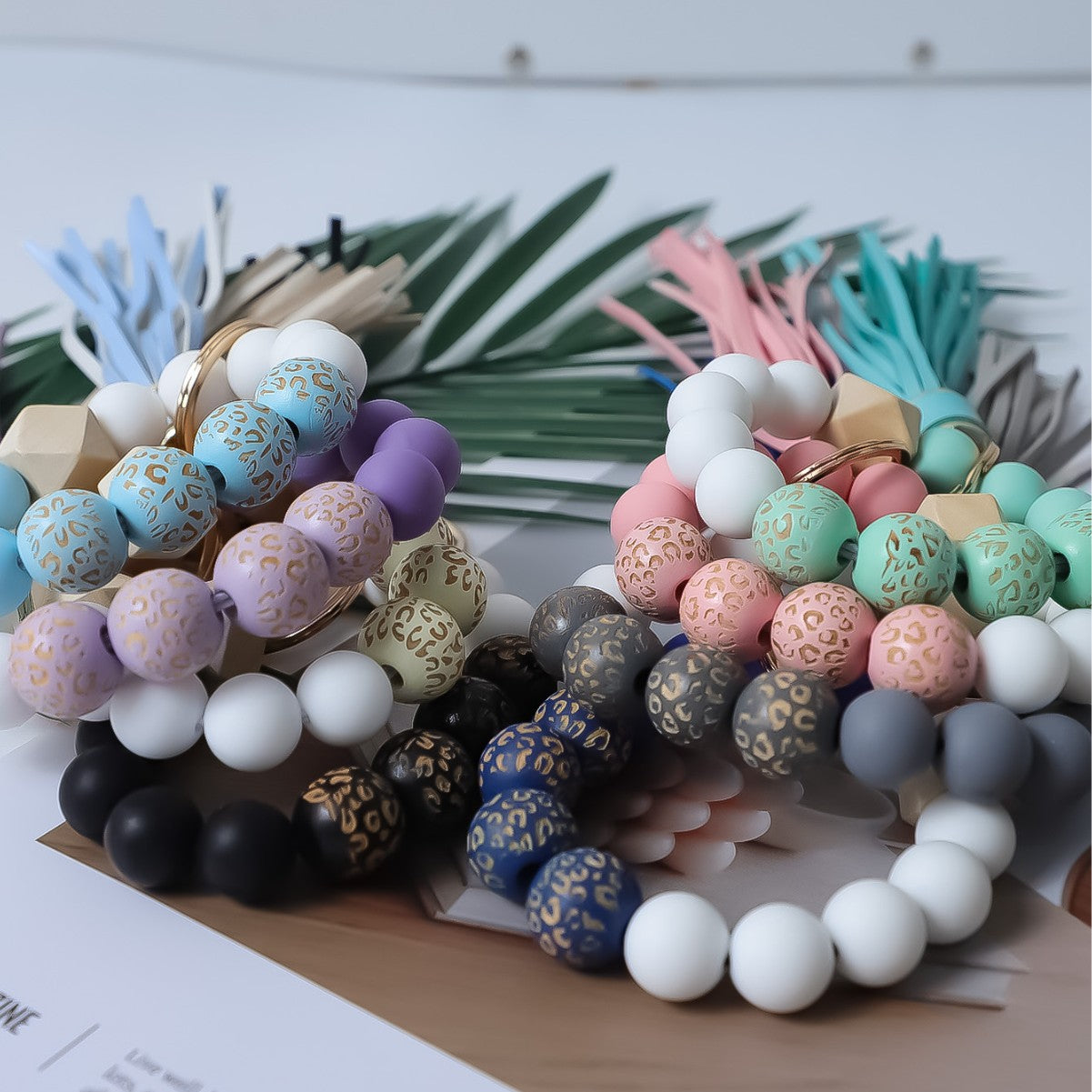 Wholesale Printed wooden bead bracelet with tassel wrist keychain